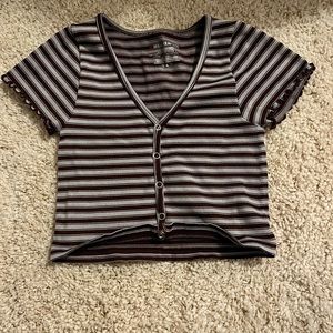 A Brownish top with stripes.